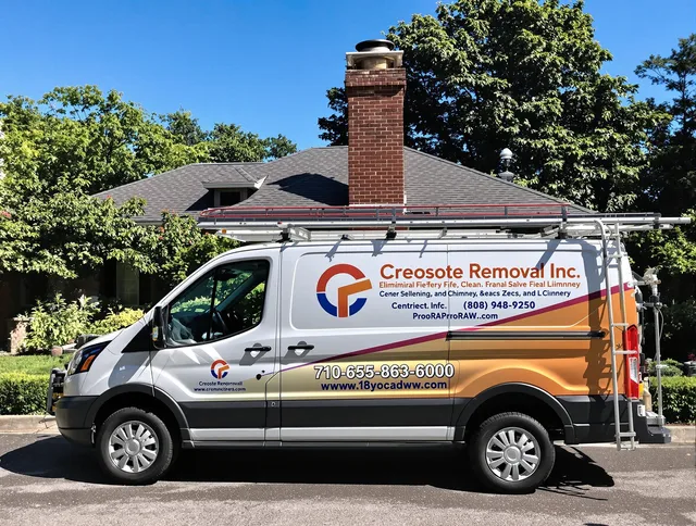 Tolland Chimney Sweep technician removing creosote safely in Tolland, CT